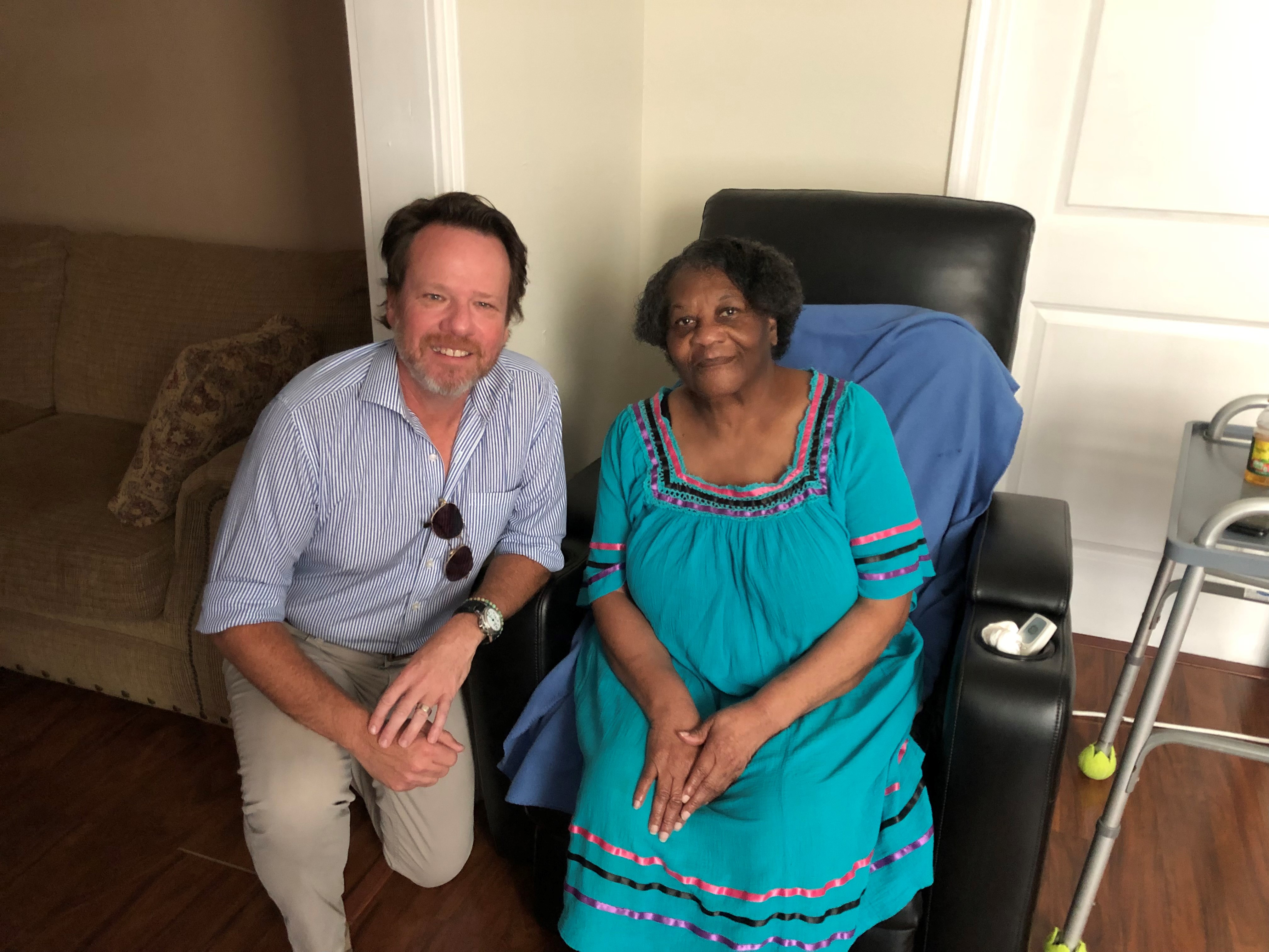 GMFS Mortgage team members assist Geraldine Scott with home improvements as part of the GMFS RAMP project