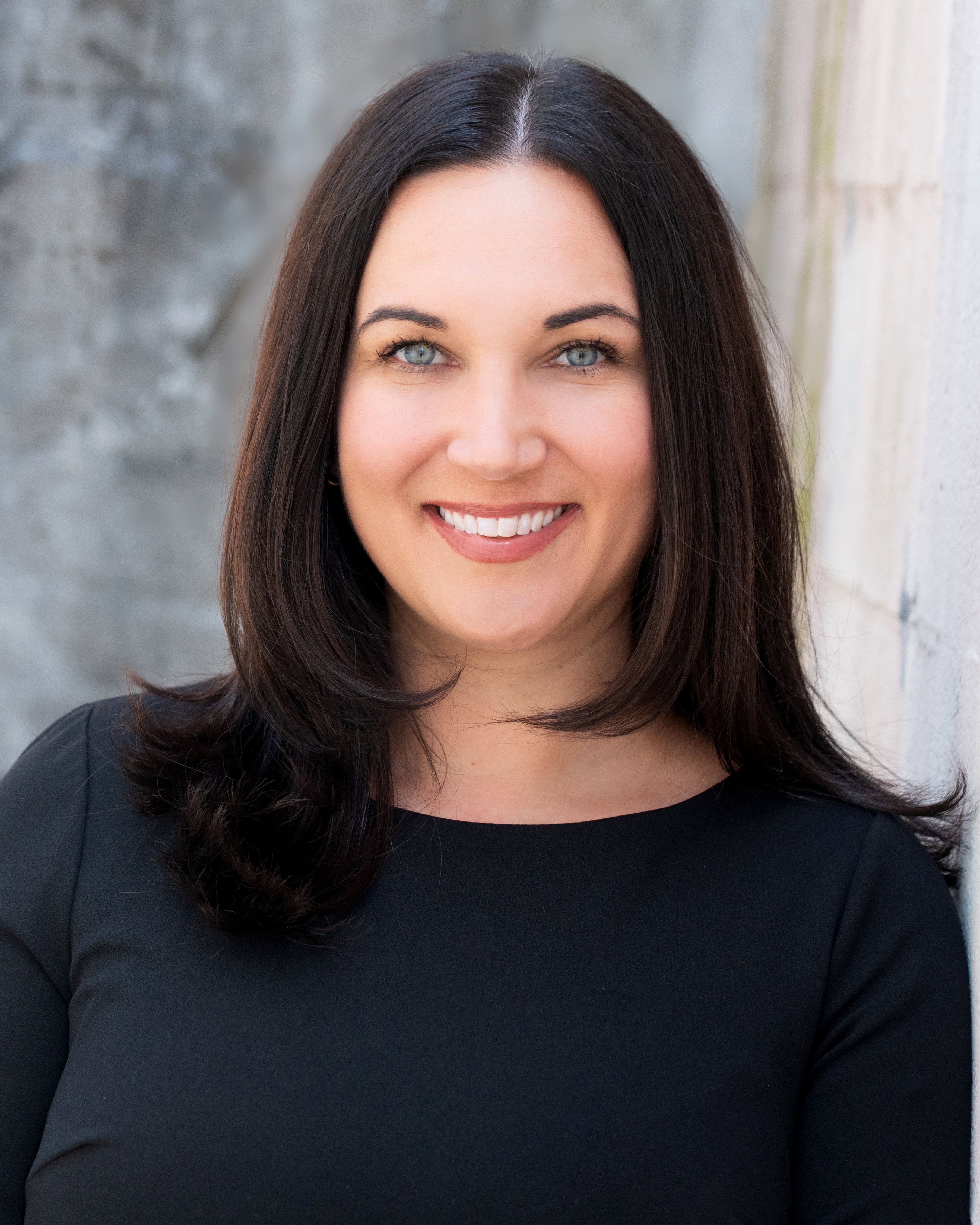 Professional headshot photo of Michelle Acosta