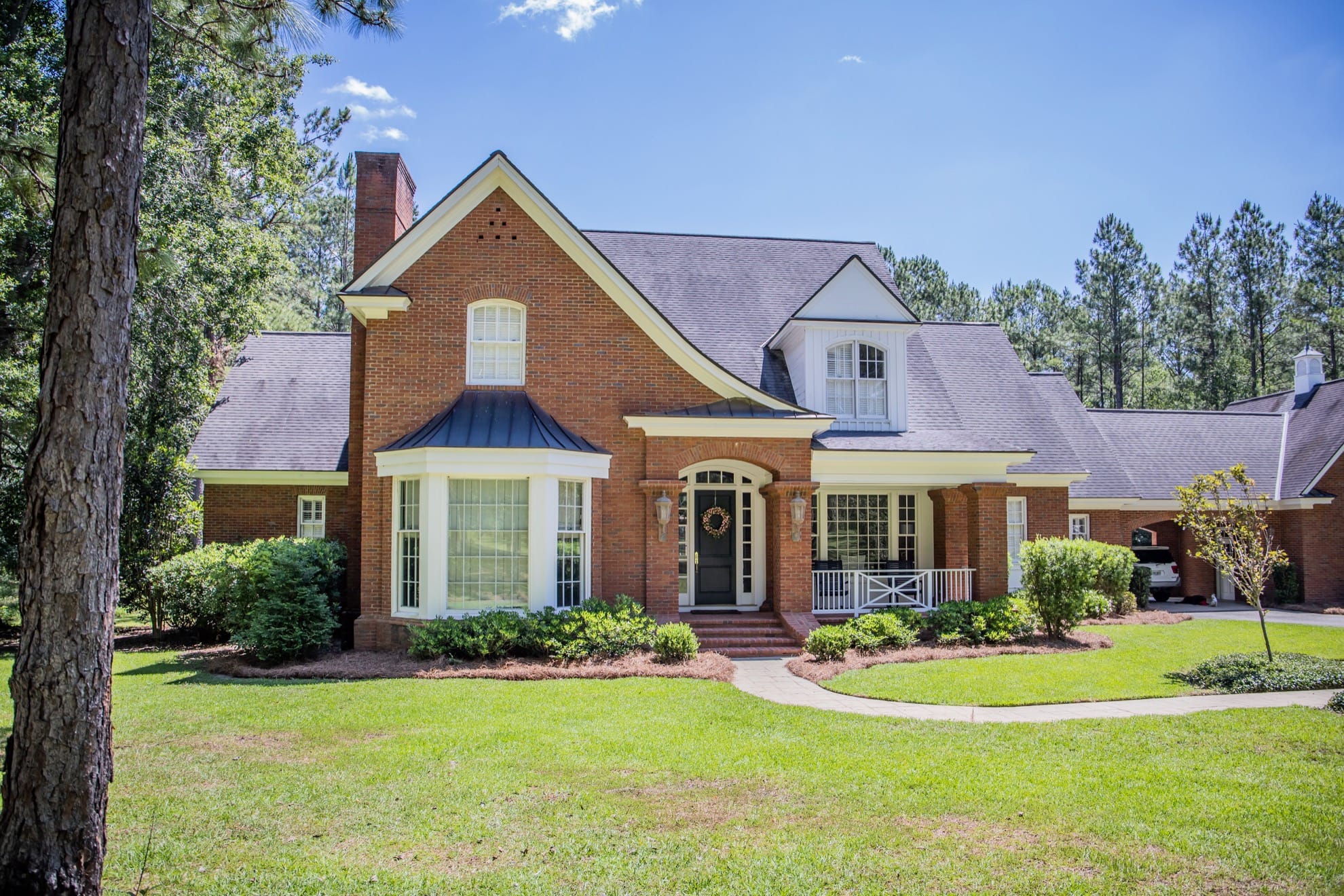 brick home with big front yard