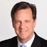 Greg Price, Mortgage Loan Officer, smiling in black blazer