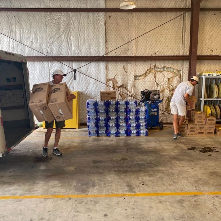 Hurricane Laura Relief - Jeff Weston, VP GMFS, Greg and Chandler Price, GMFS, unload supplies in Lake Charles.