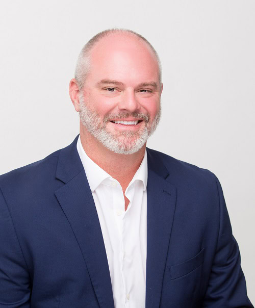 Josh Foster, Mortgage Loan Officer, smiling in dark blazer.