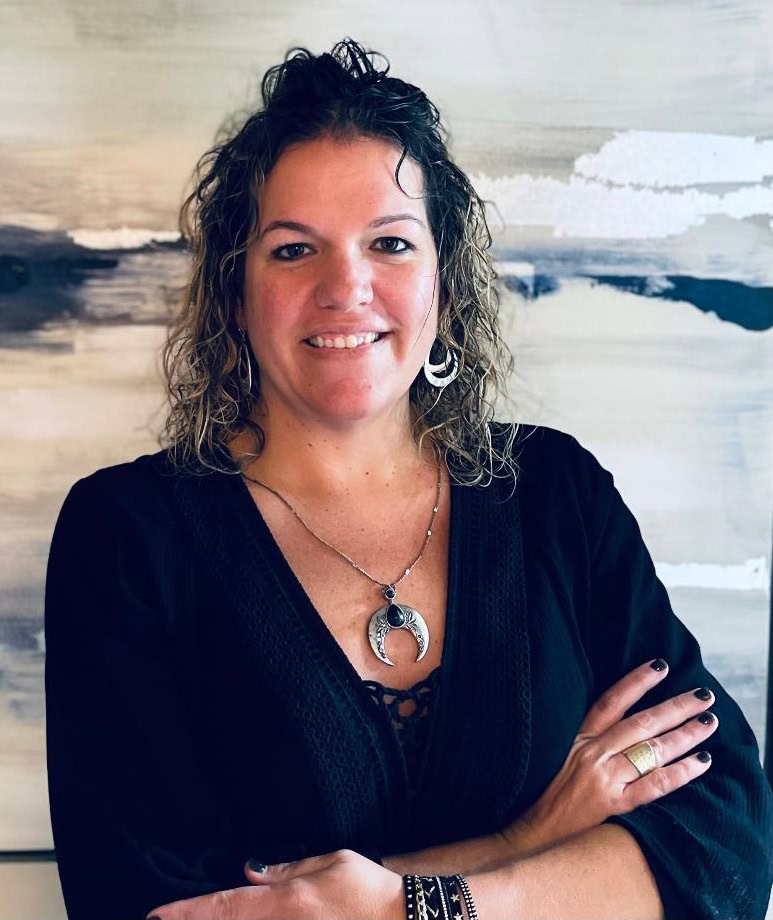 Lindsay Huff, Mortgage Loan Officer, smiling in dark blouse.